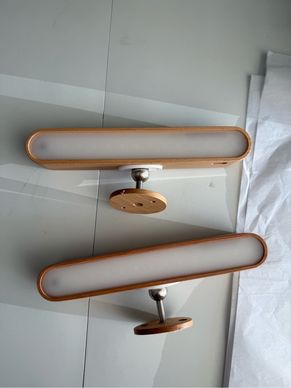 Rechargeable wireless wall sconces in light wood